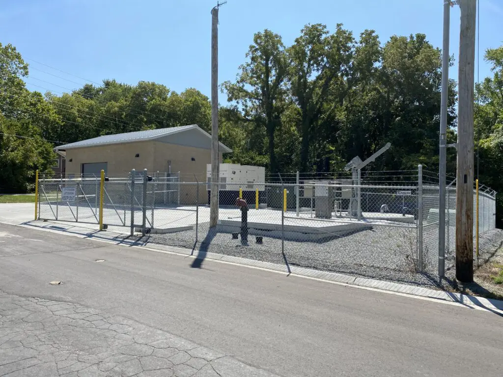 A building with a fence in front of it.