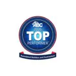 A blue circular badge with "ABC 2026 Top Performer" in white text, and a red ribbon below reading "Associated Builders and Contractors.