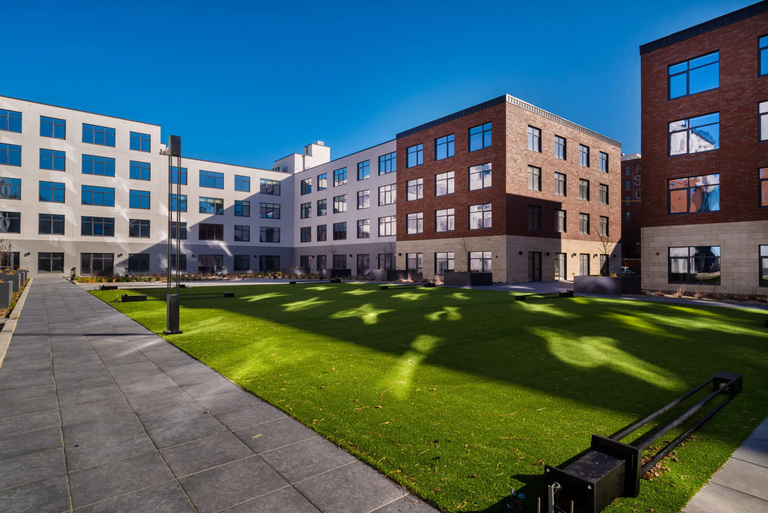Exterior of Second plus Delaware Apartment buildings.