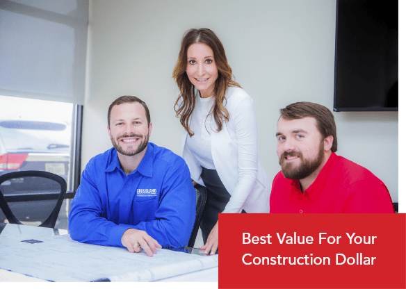 Three Crossland Construction employees smiling.