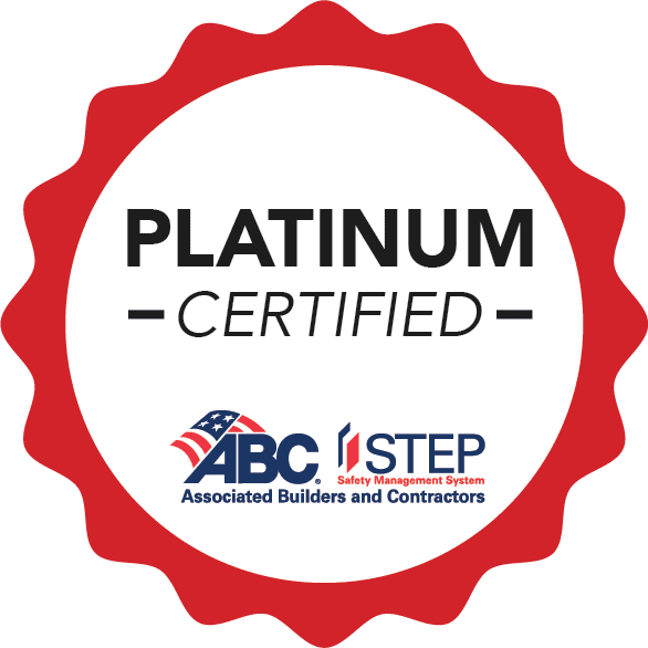 A red-edged badge with "PLATINUM CERTIFIED" in bold text above the ABC Safety Management System logo and "Associated Builders and Contractors.