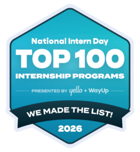 A blue hexagonal badge reads “National Intern Day Top 100 Internship Programs, presented by yello + WayUp. We made the list! 2026.”.