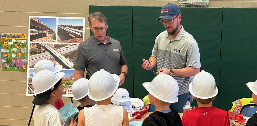 Crossland Heavy Contractors Arkansas team members at a STEM night with students.