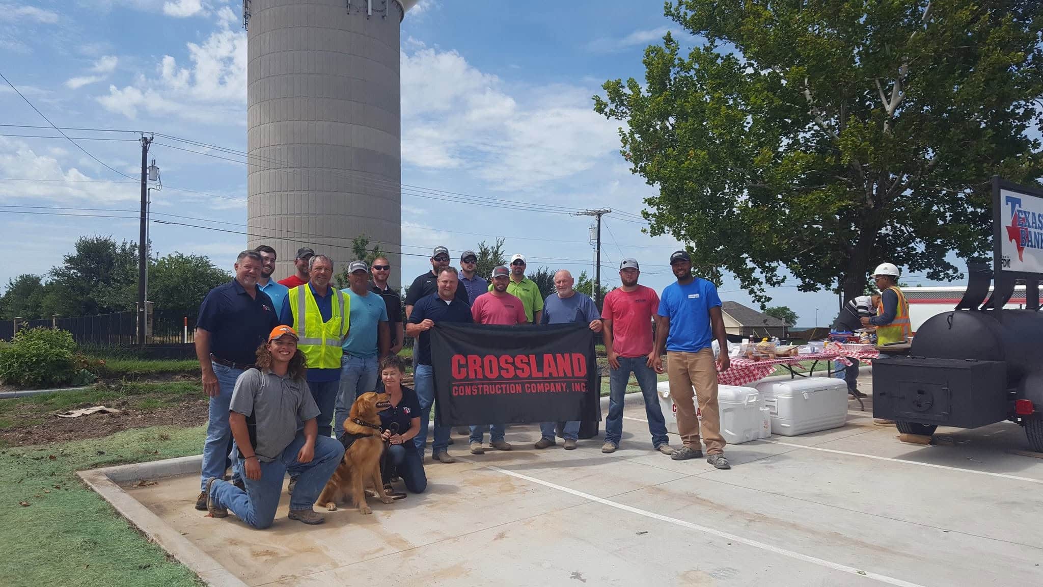 Crossland team with community volunteers at an outdoor event
